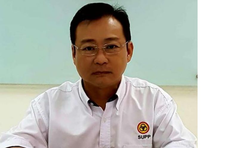 砂人联党实达干支部主席沈坚石。