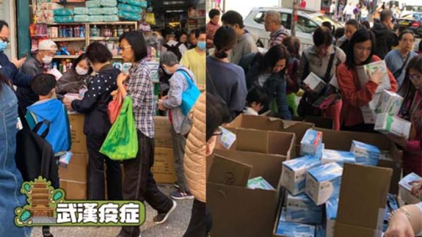 有新蒲岗药房门外放置十多箱口罩，大批市民蜂拥抢购，部份人更一次过购买数盒防备。